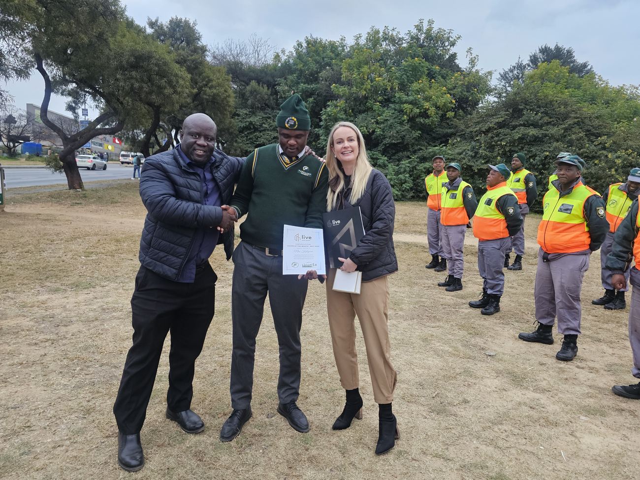 Lauren-Kate Fletcher presenting a Guard of the Month certificate